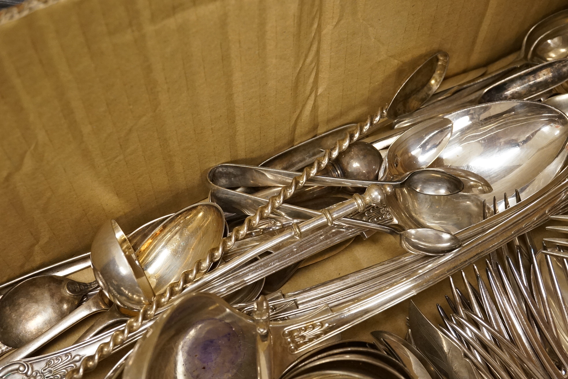 A quantity of assorted plated flatware including Kings pattern and beaded Old English pattern.